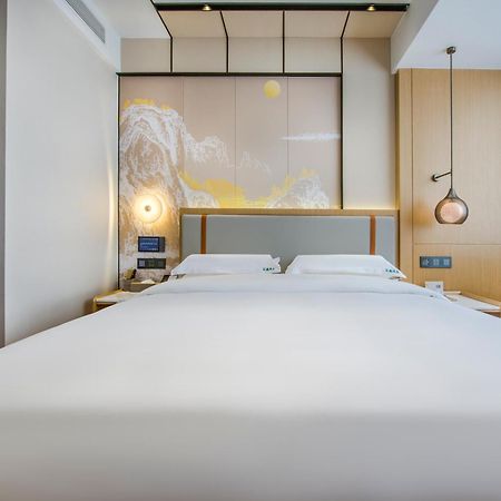 Yiwu Baide Theme Hotel Buitenkant foto