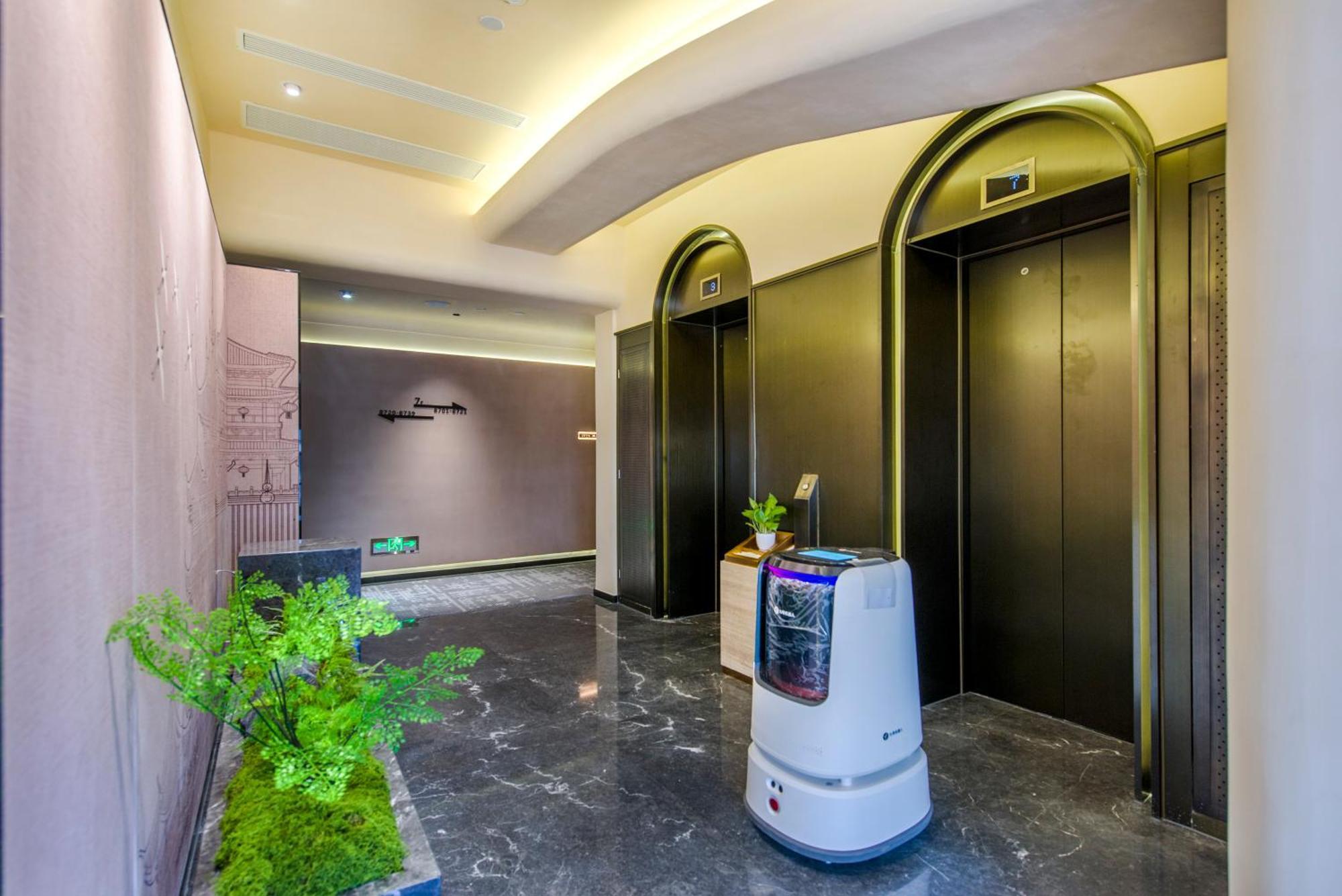 Yiwu Baide Theme Hotel Buitenkant foto