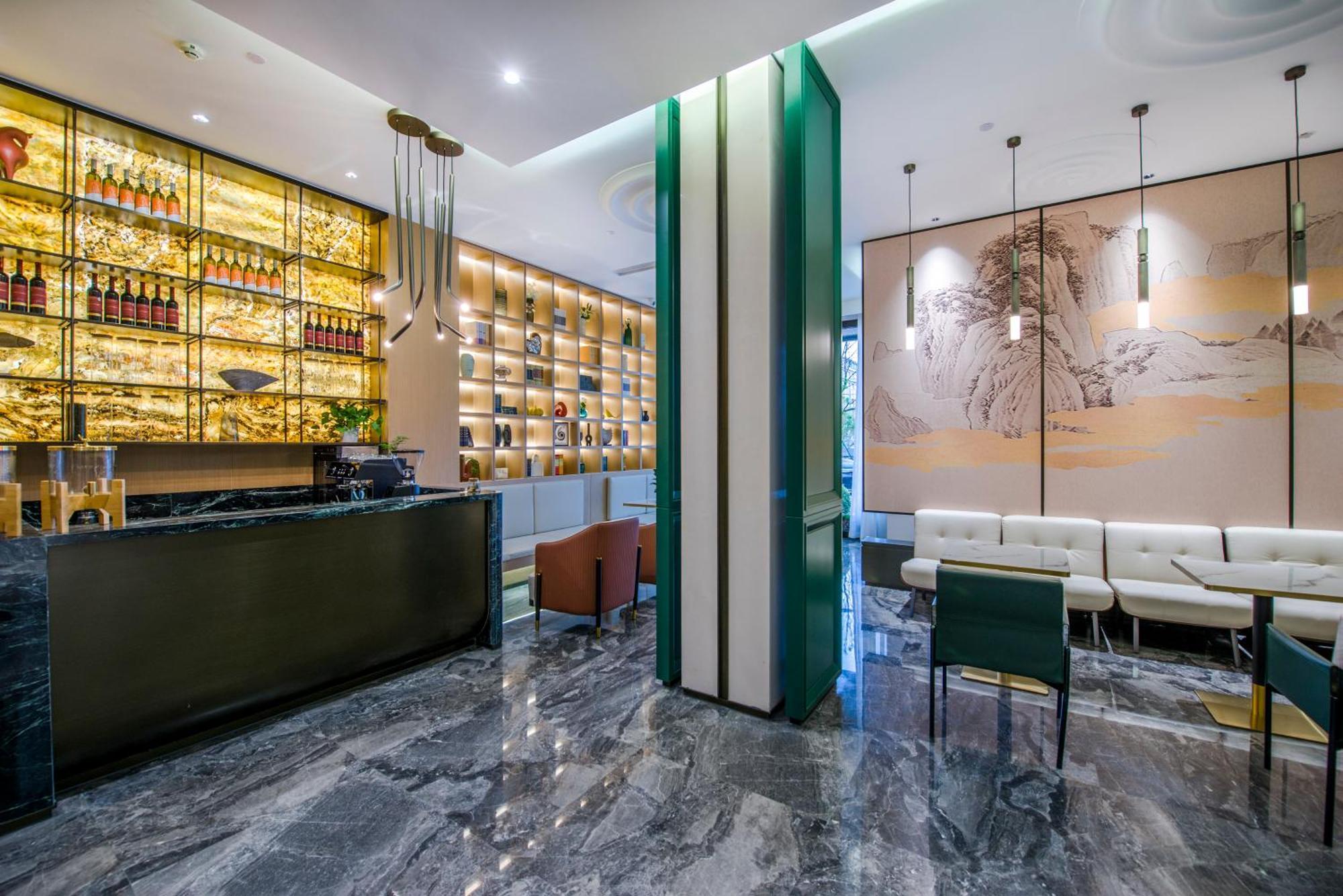 Yiwu Baide Theme Hotel Buitenkant foto