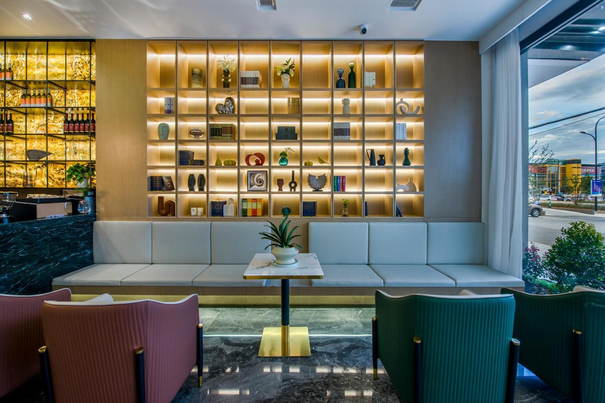 Yiwu Baide Theme Hotel Buitenkant foto