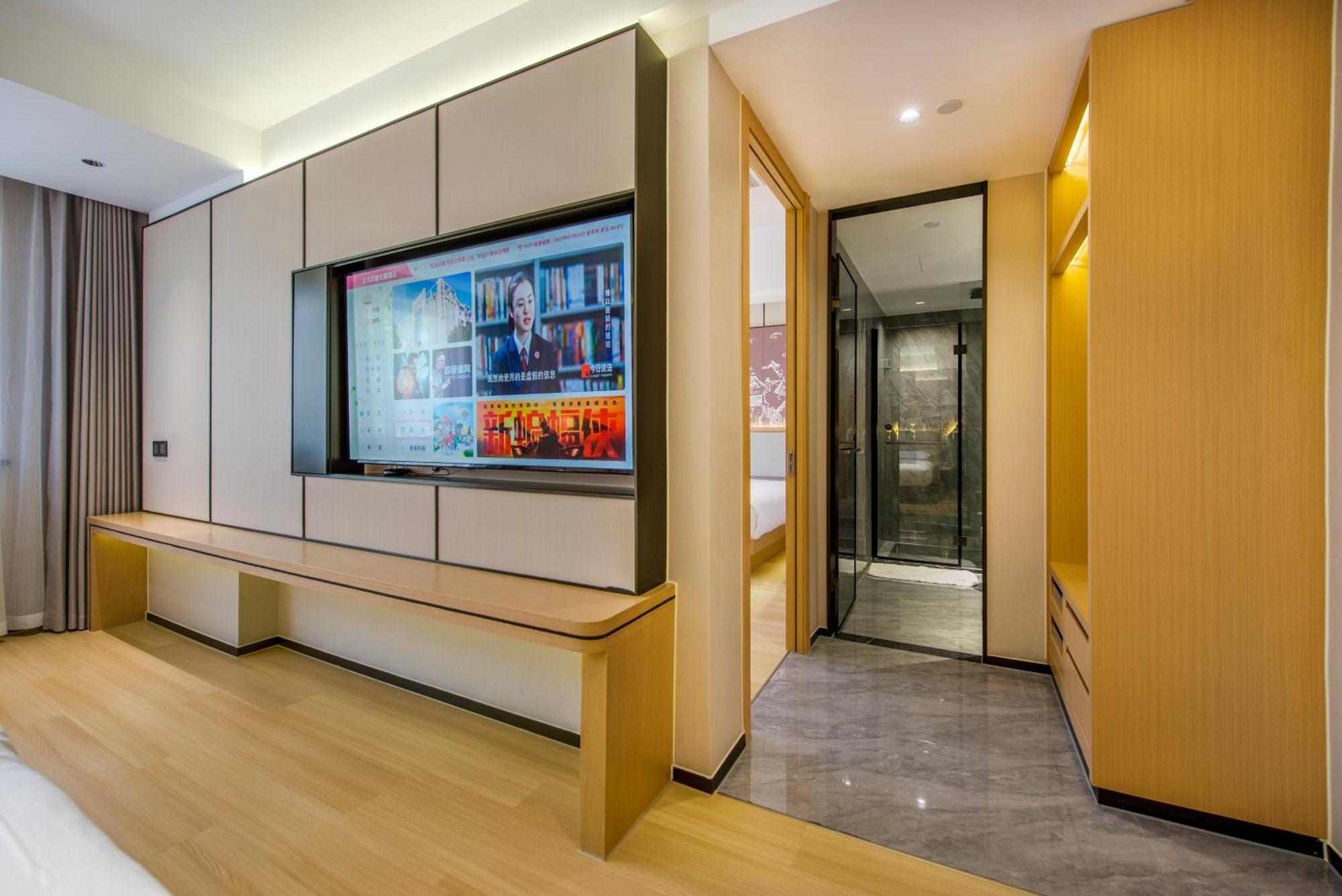 Yiwu Baide Theme Hotel Buitenkant foto