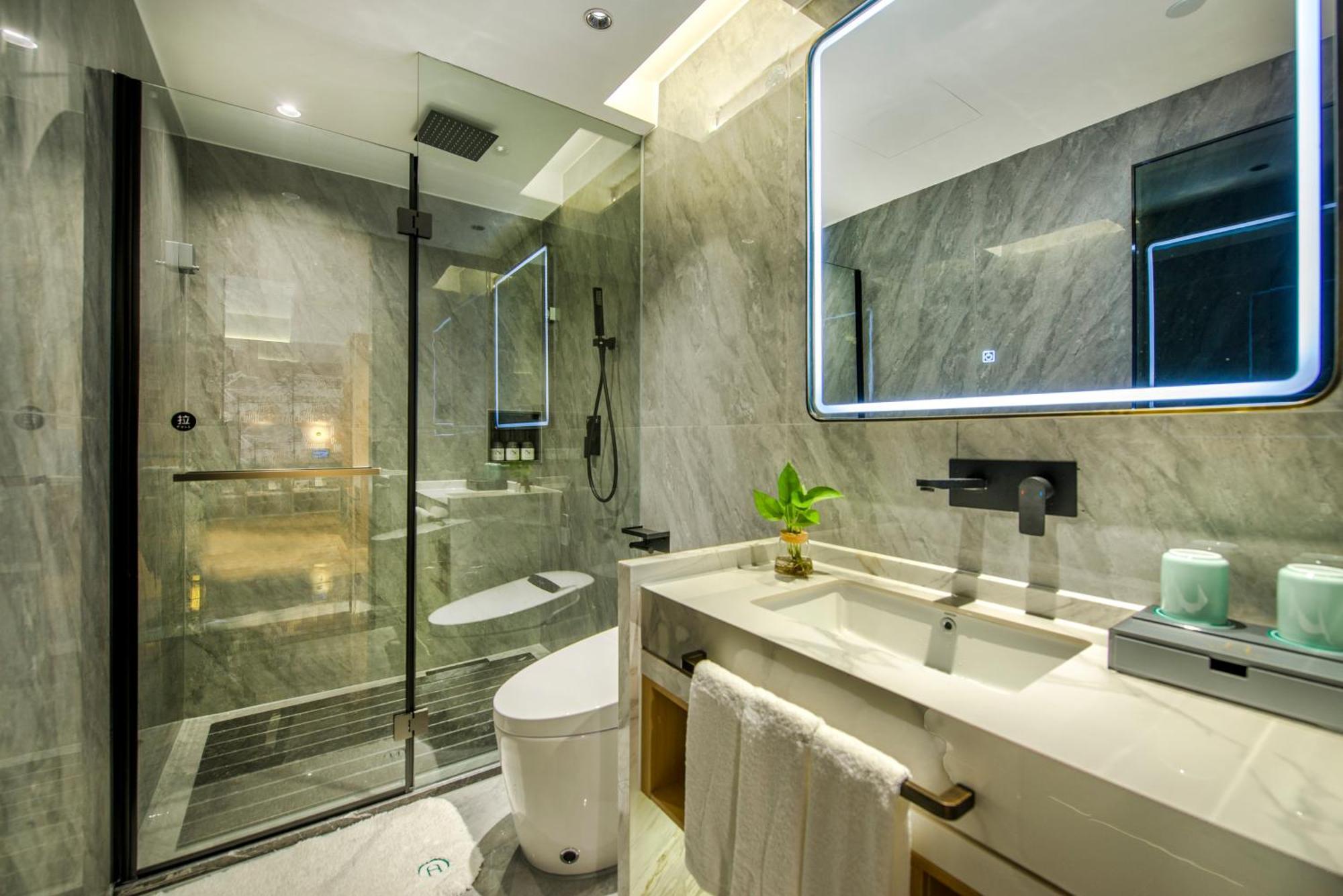 Yiwu Baide Theme Hotel Buitenkant foto
