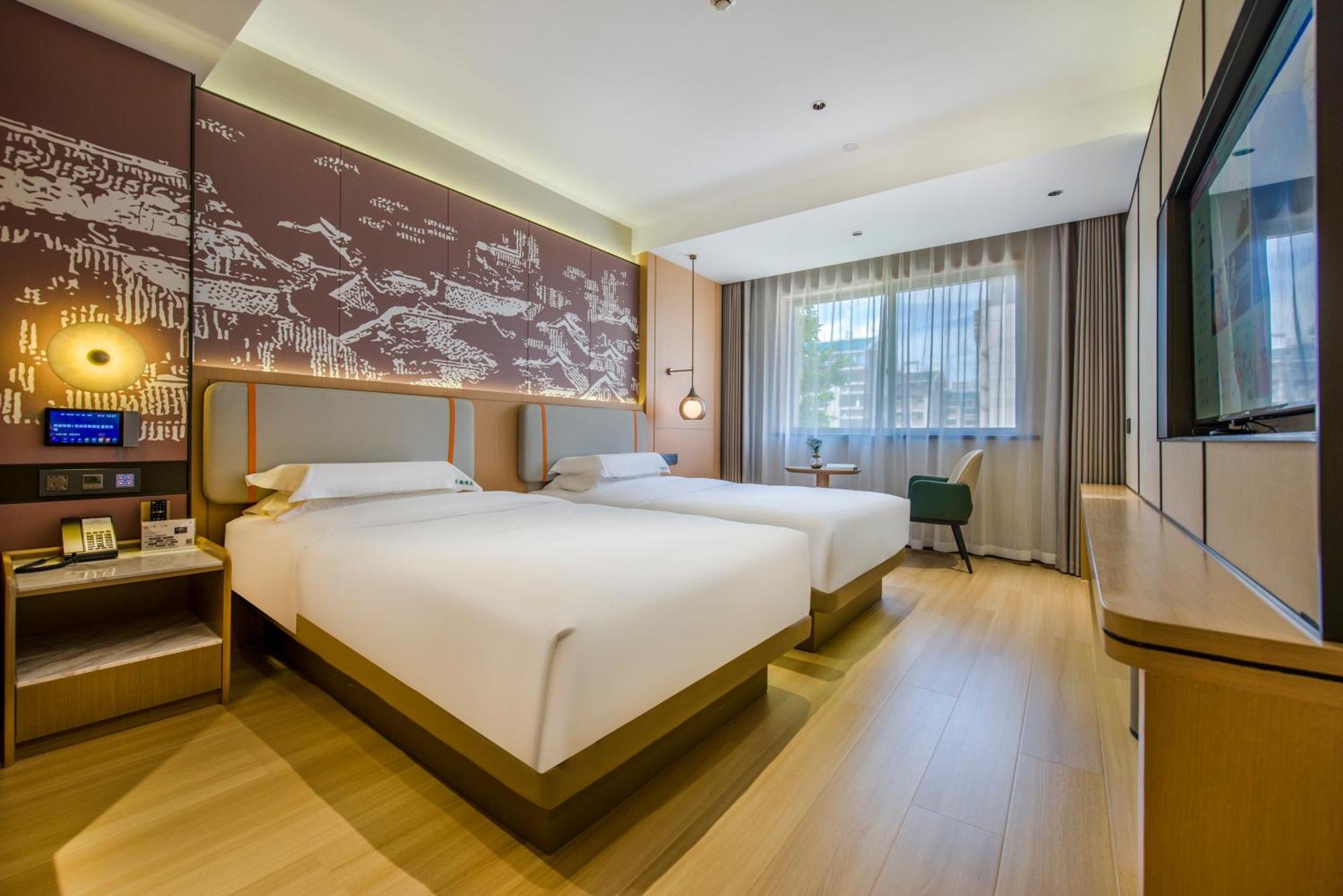 Yiwu Baide Theme Hotel Buitenkant foto