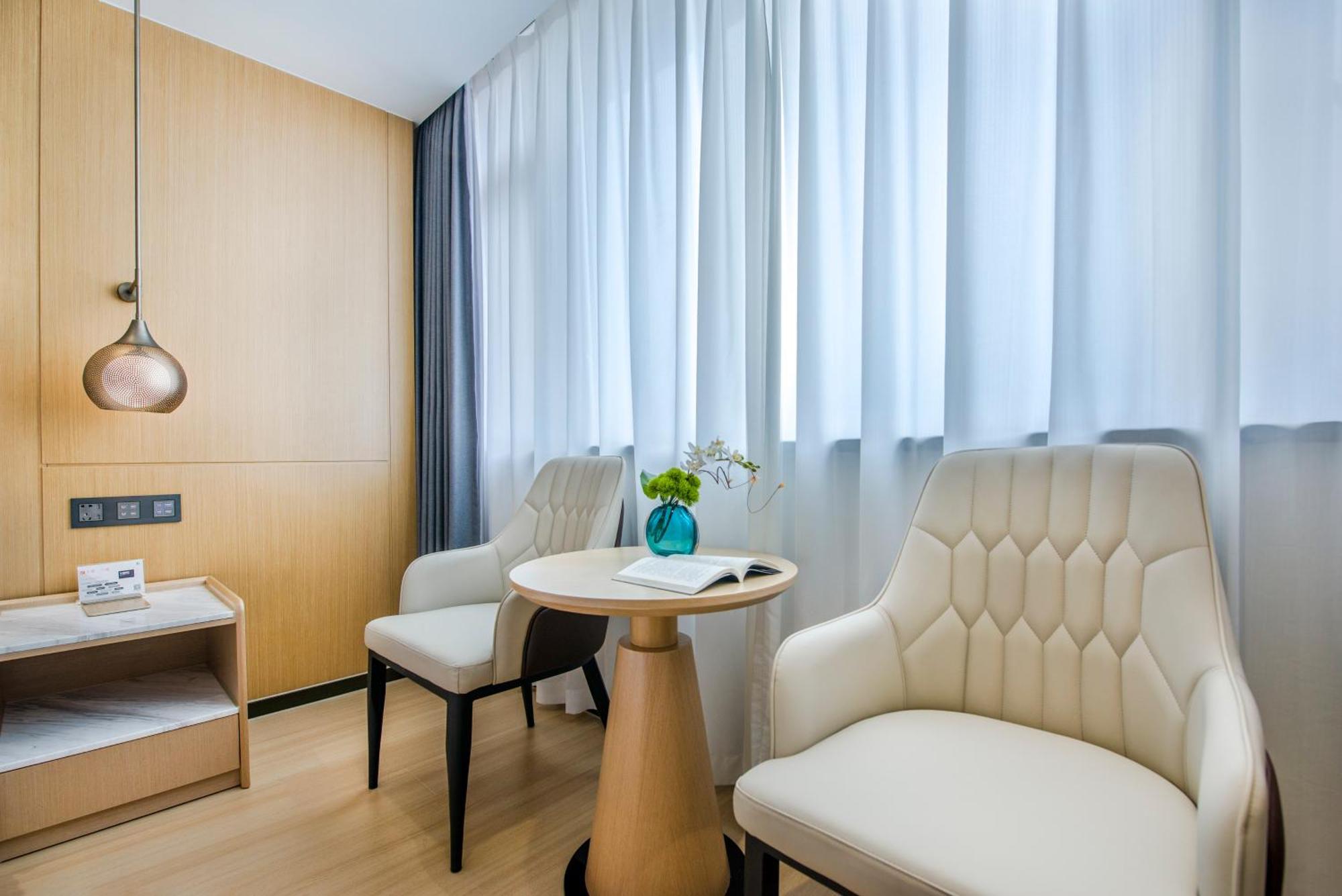 Yiwu Baide Theme Hotel Buitenkant foto