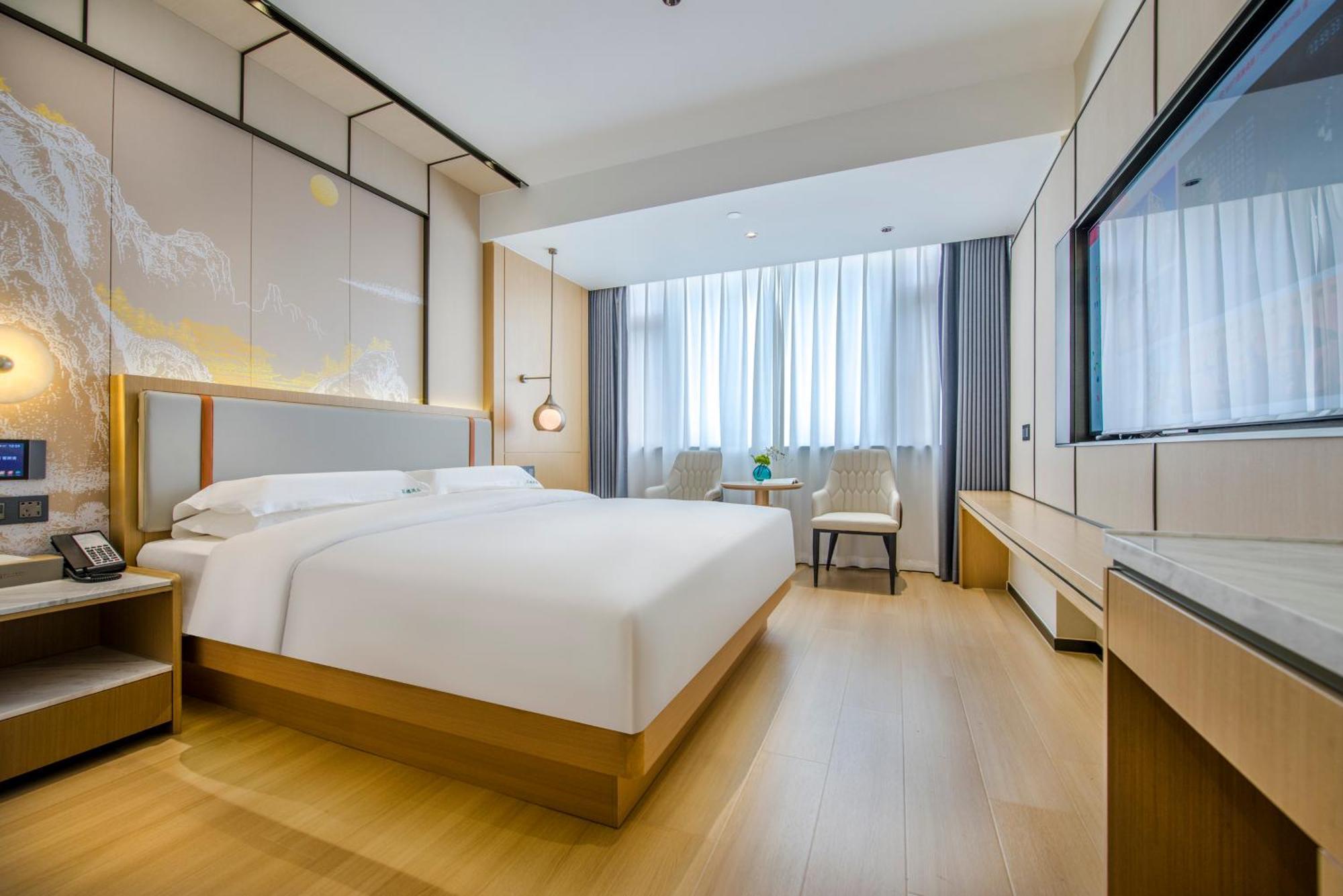Yiwu Baide Theme Hotel Buitenkant foto