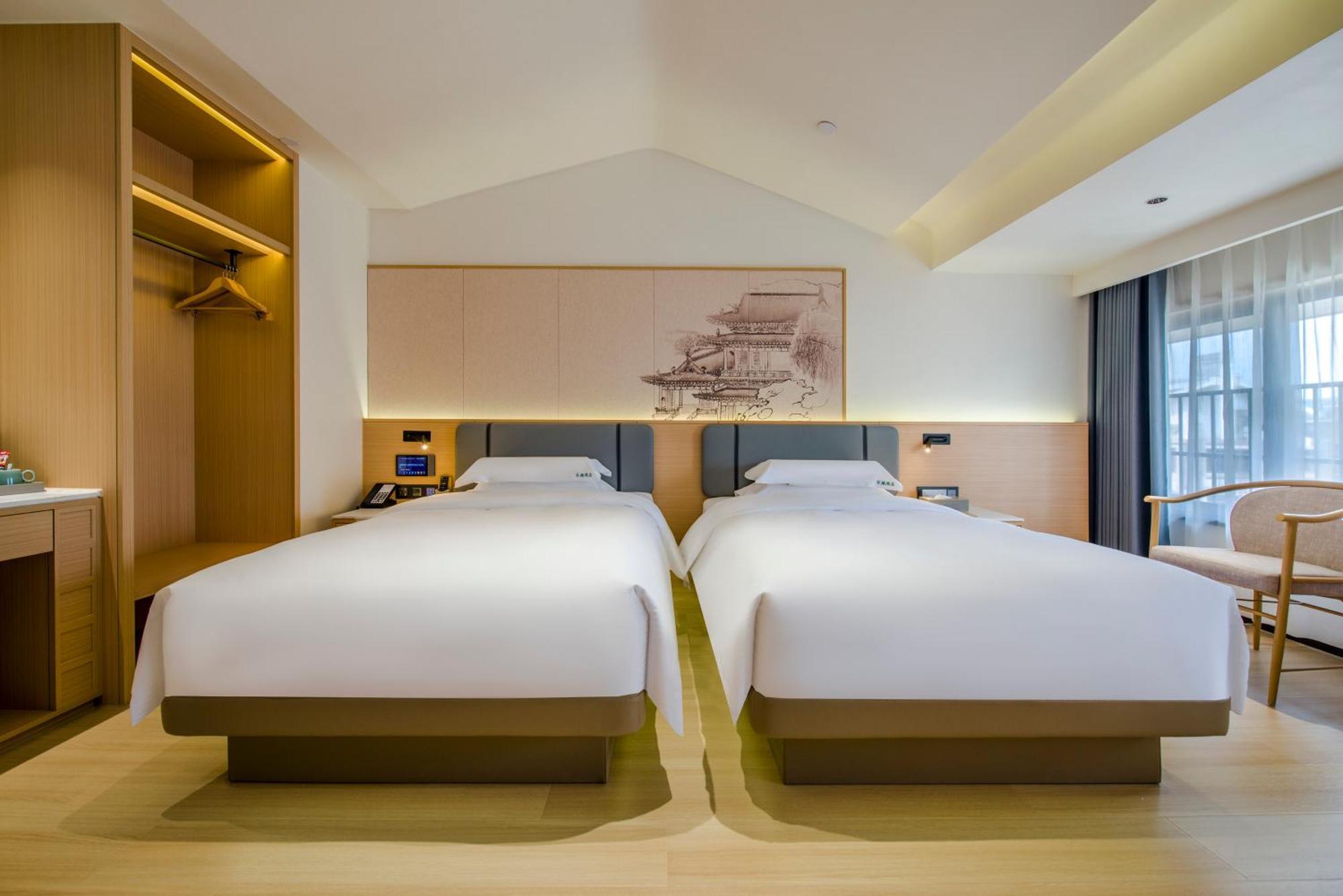 Yiwu Baide Theme Hotel Buitenkant foto