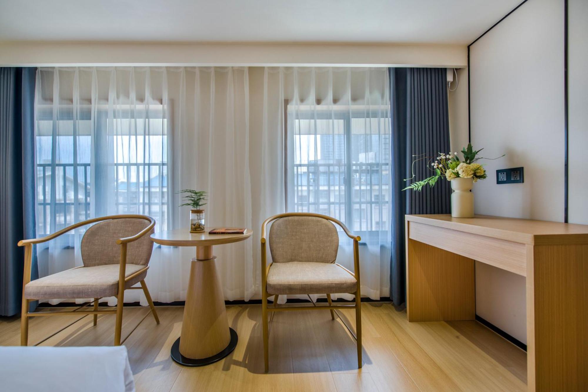 Yiwu Baide Theme Hotel Buitenkant foto