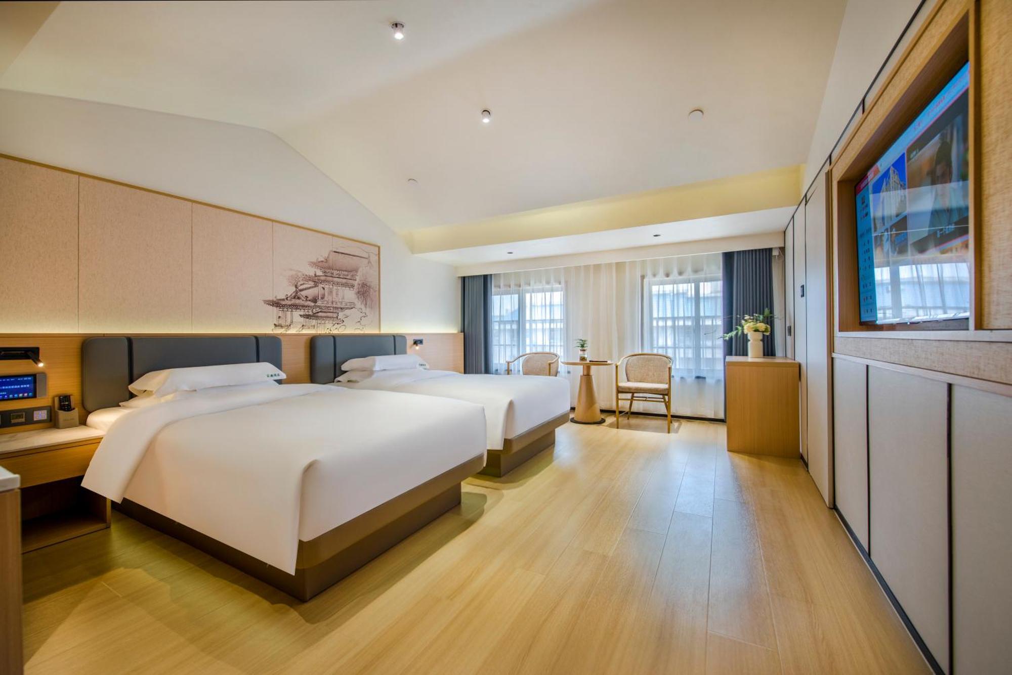 Yiwu Baide Theme Hotel Buitenkant foto