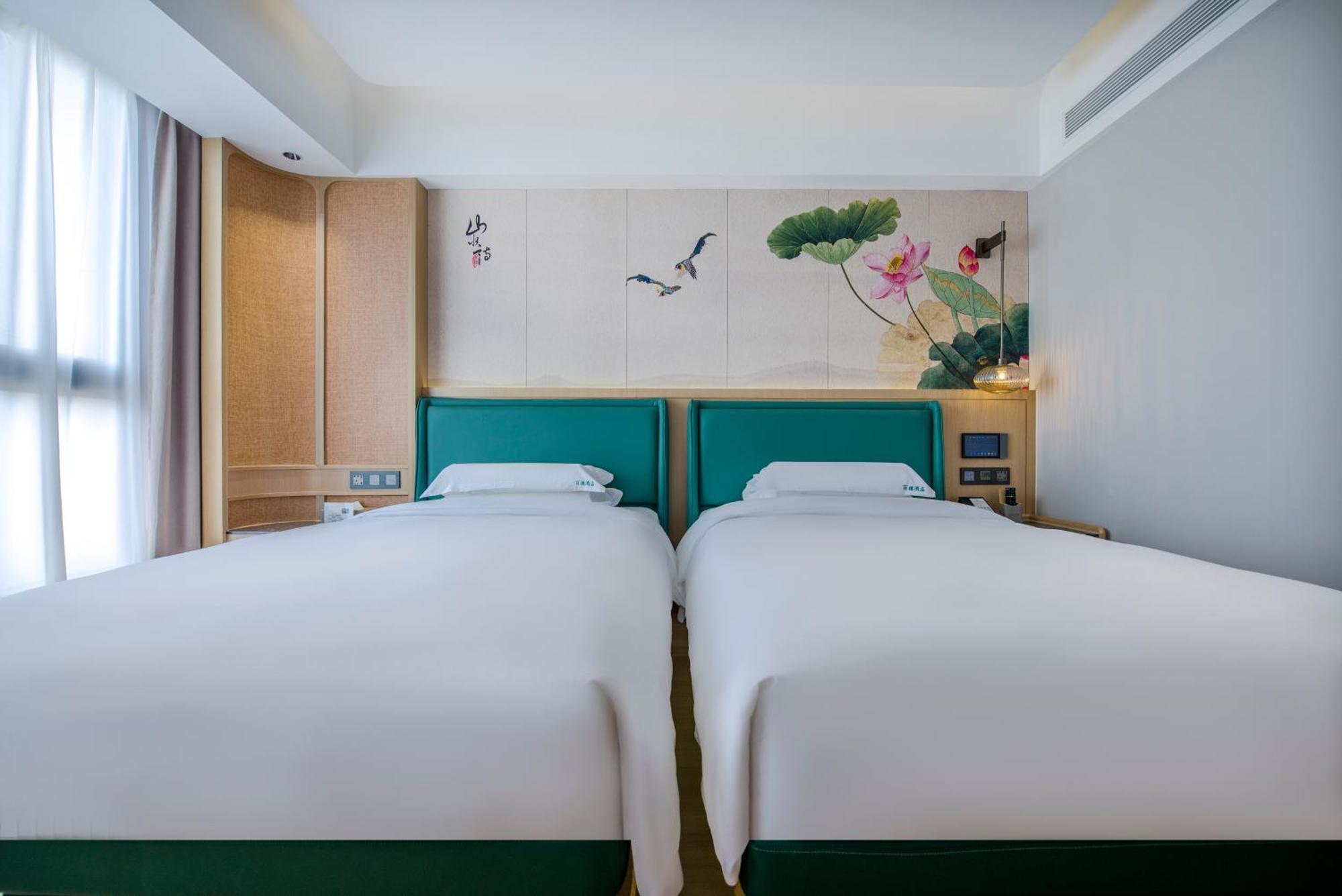 Yiwu Baide Theme Hotel Buitenkant foto