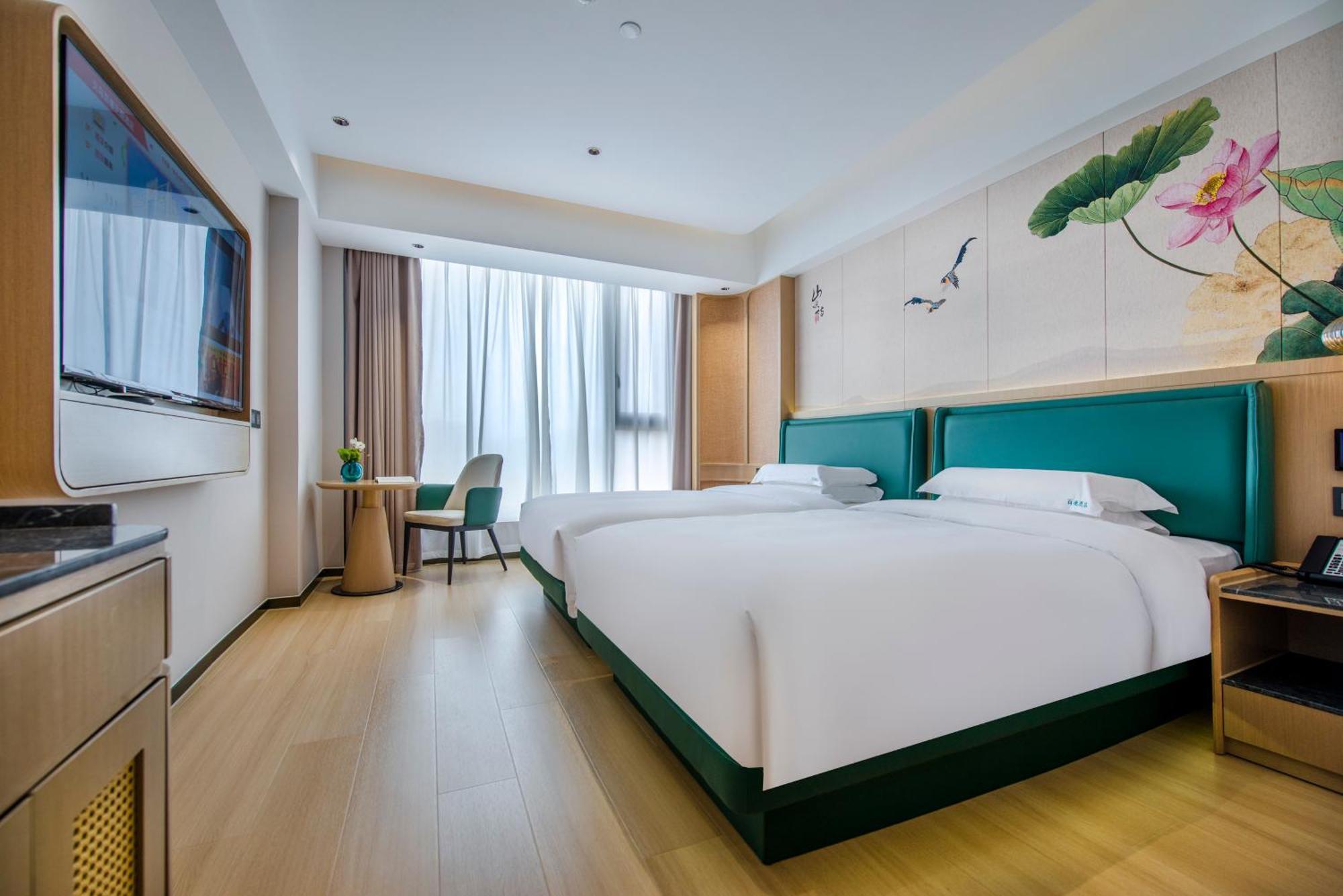 Yiwu Baide Theme Hotel Buitenkant foto