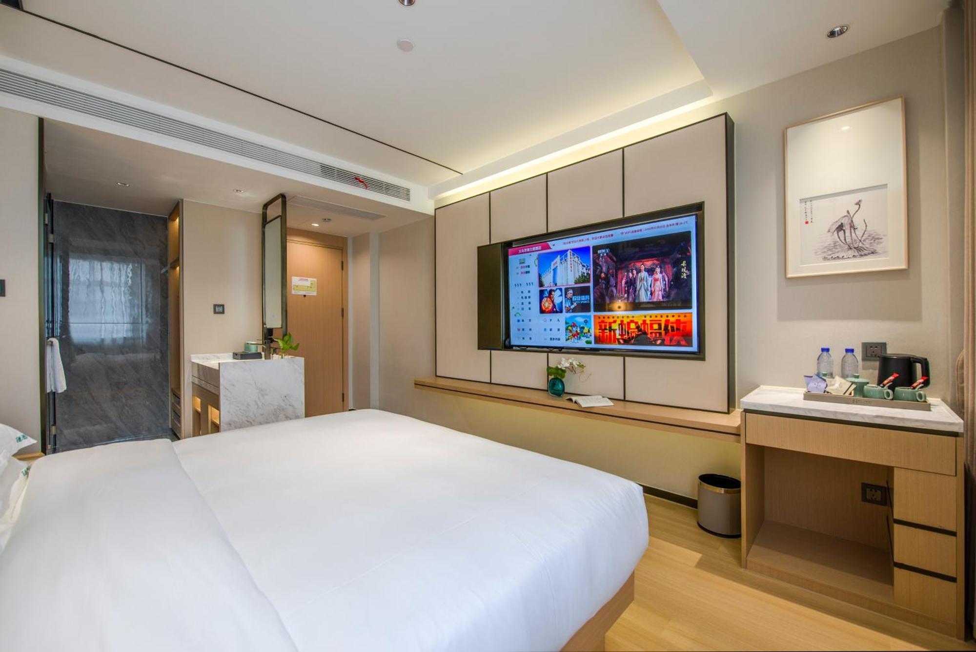 Yiwu Baide Theme Hotel Buitenkant foto