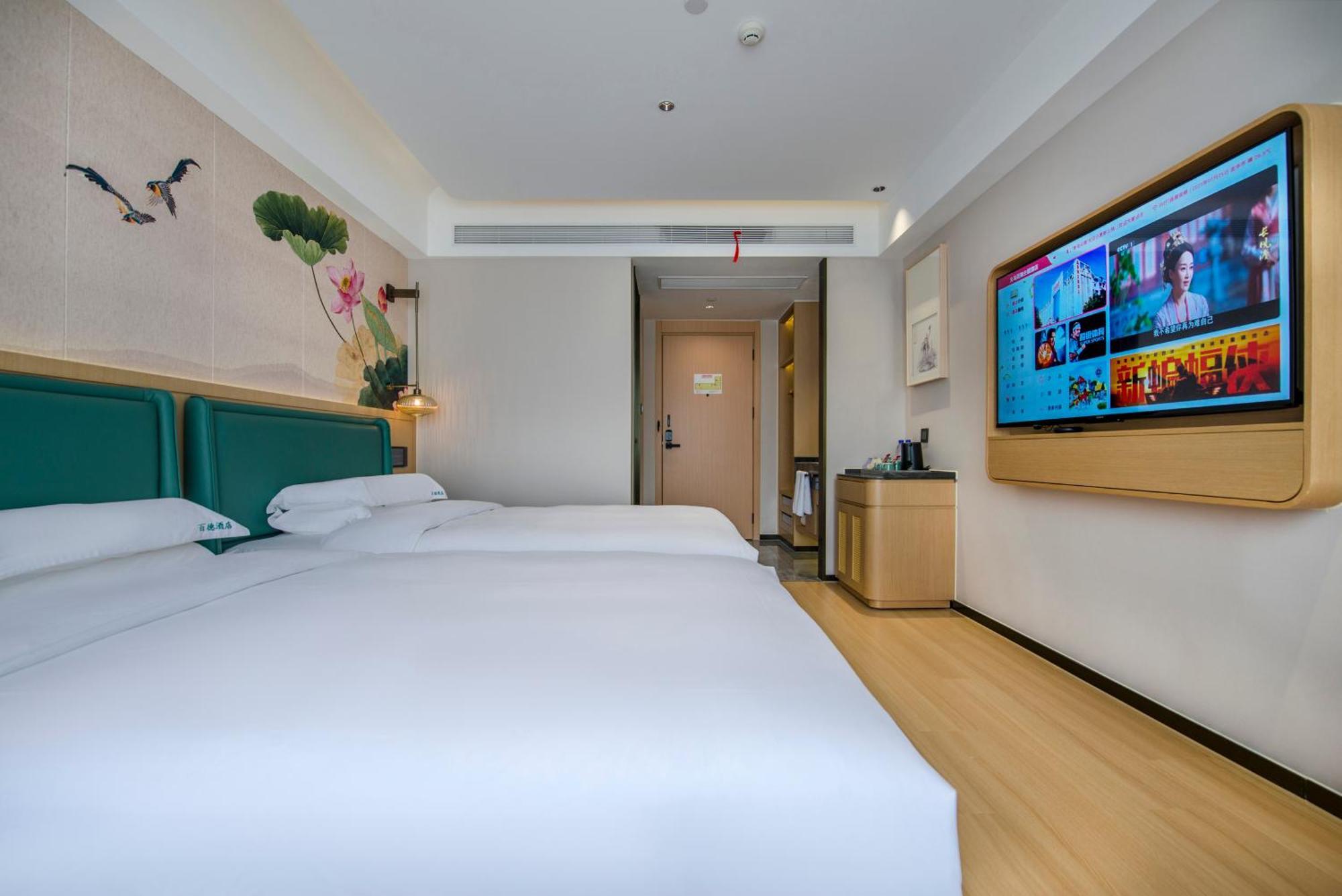 Yiwu Baide Theme Hotel Buitenkant foto