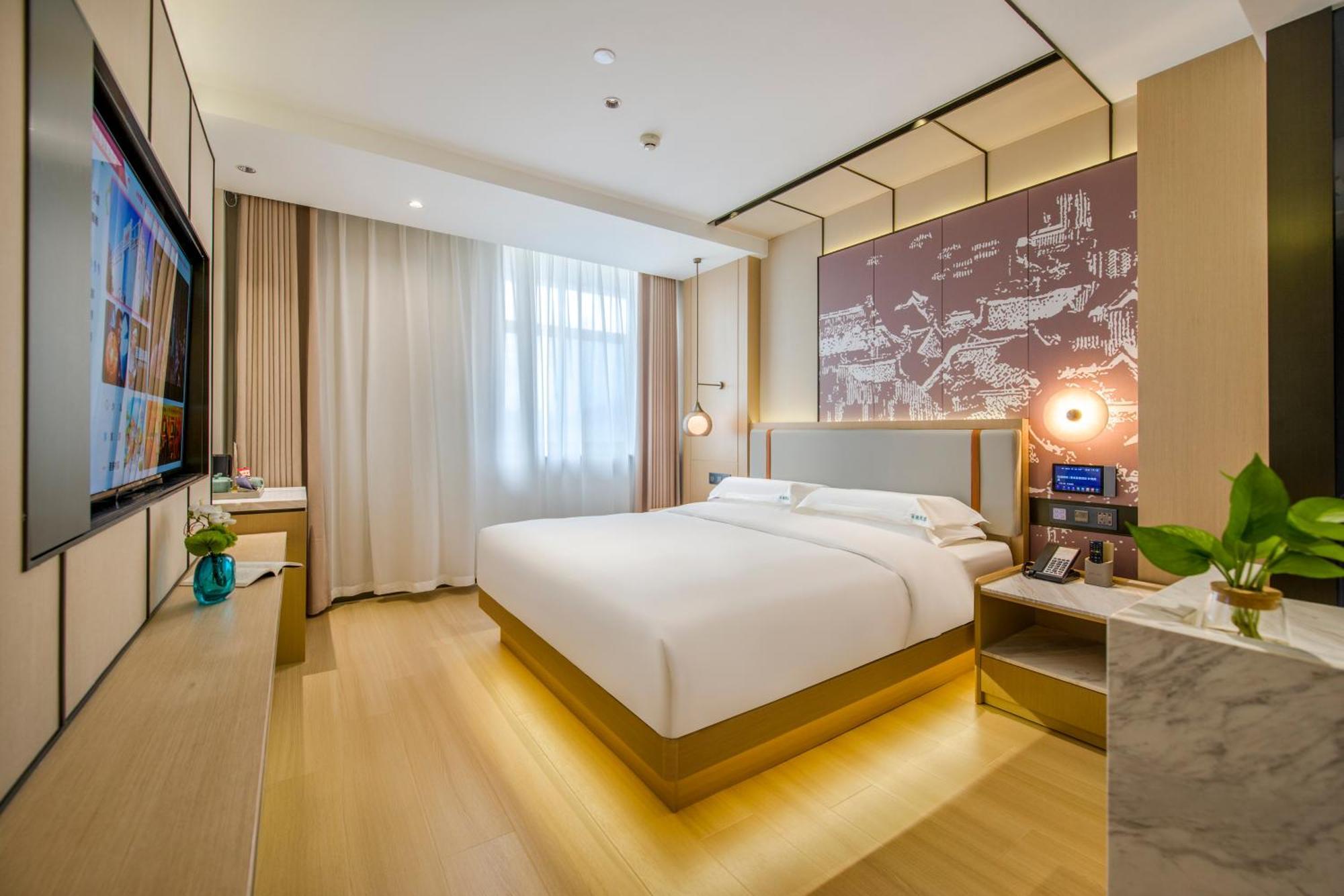 Yiwu Baide Theme Hotel Buitenkant foto