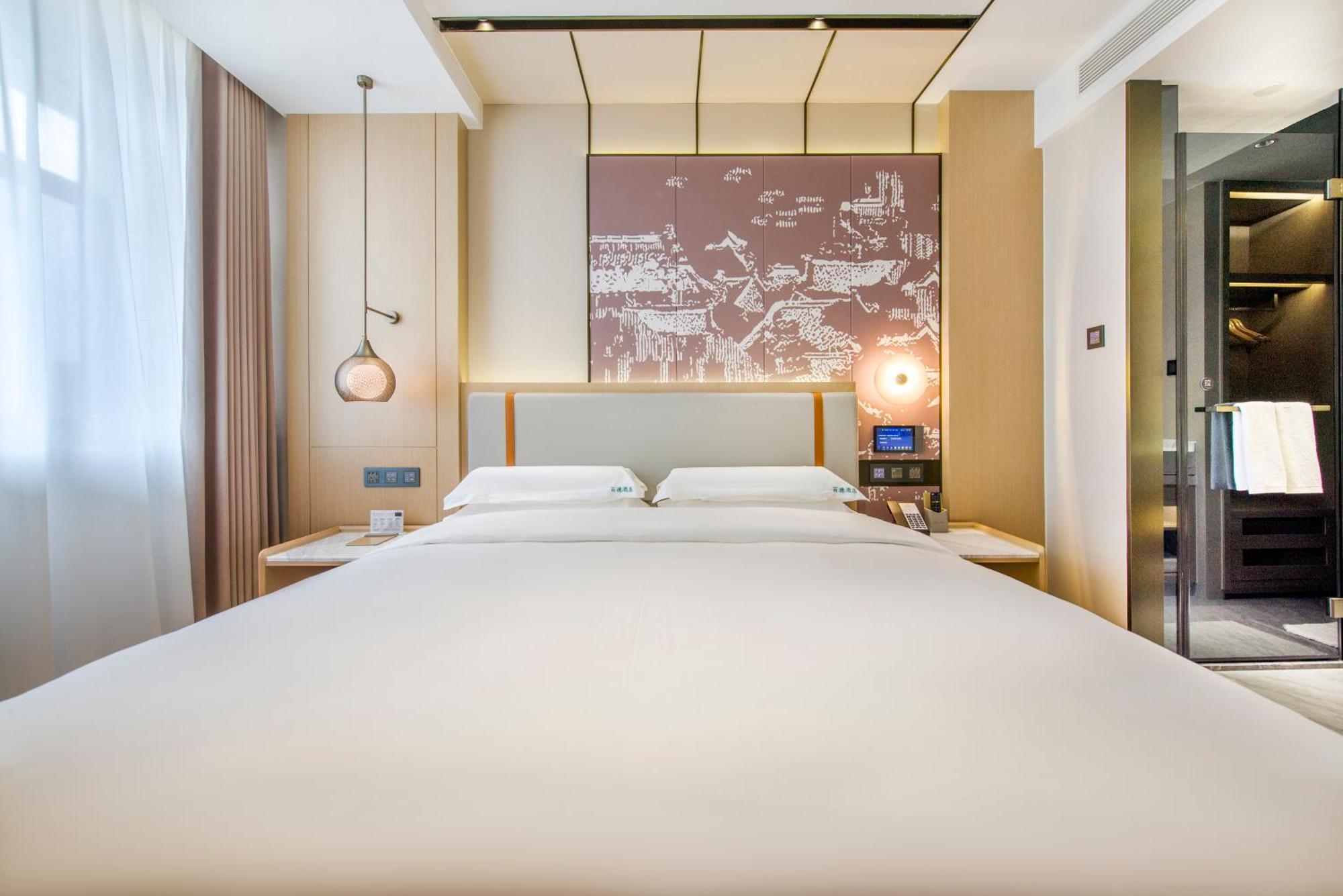 Yiwu Baide Theme Hotel Buitenkant foto