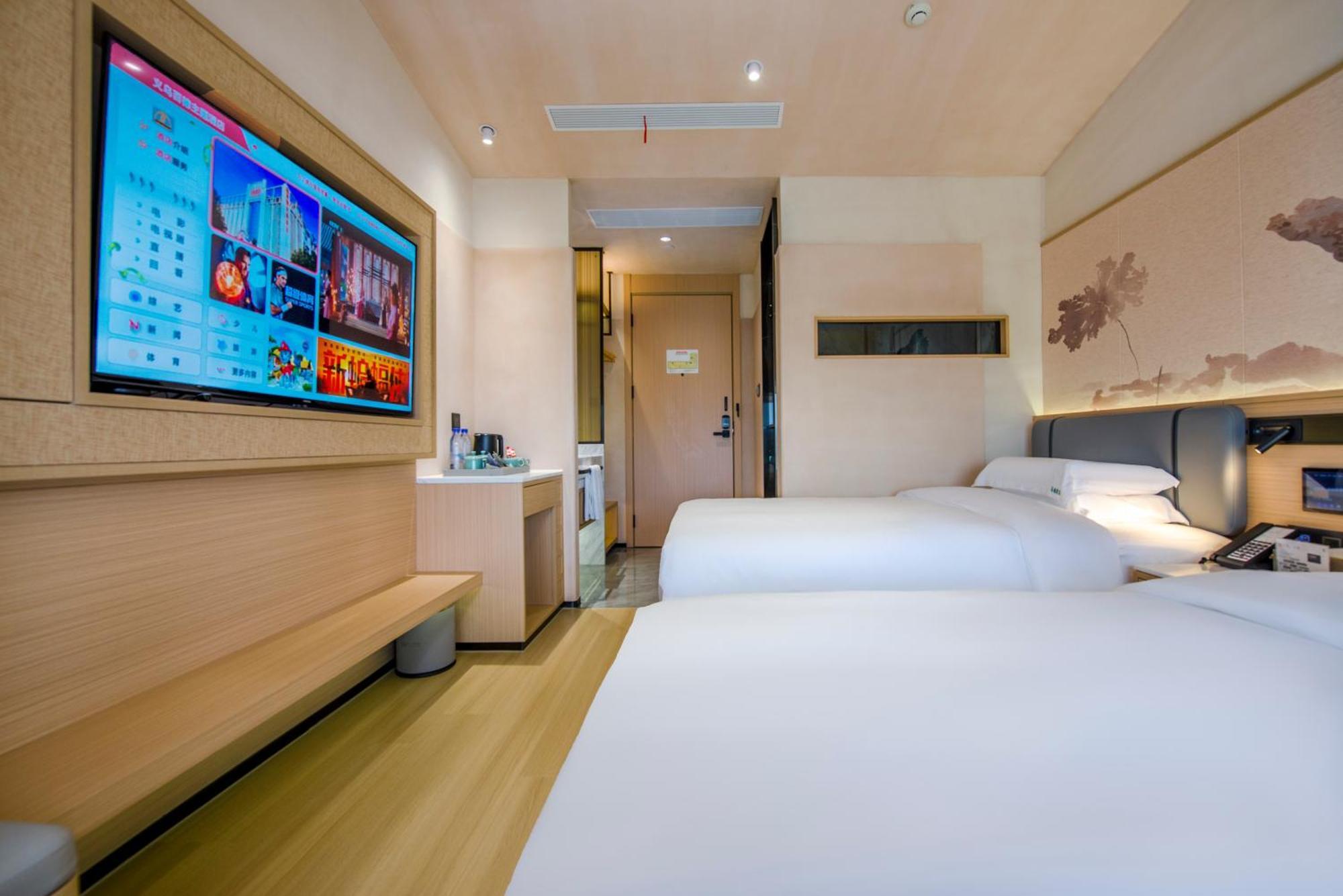 Yiwu Baide Theme Hotel Buitenkant foto